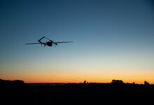 An autonomous vehicle dubbed Blue Water Maritime Logistics UAS flies over Unmanned Air Test and Evaluation (UX) 24 during a demonstration flight at Naval Air Station Patuxent River November 4, 2020.