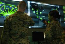 Marines with Marine Corps Forces Cyberspace Command at the cyber operations center at Lasswell Hall aboard Fort Meade, Maryland, 2020.