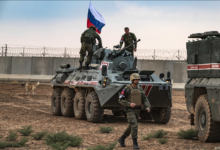 Russian troops with military vehicles are seen on patrol outside the town of Darbasiyah in Syria's northeastern Hasakeh province, on the border with Turkey, Novemer 1, 2019