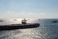 The US Navy’s only forward-deployed aircraft carrier, USS Ronald Reagan (CVN 76), steams in formation with ships from the Japan Maritime Self-Defense Force, Royal Australian Navy, and Indian Navy during Exercise Malabar 2022