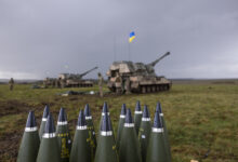 155mm artillery rounds stacked up behind the line of AS90s and their Ukrainian operators. Photographer: Corporal Rob Kane ©MoD Crown Copyright 2022