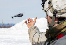 U.S. Army Sgt. Nicholas Sutton, an infantryman assigned to the 1st Battalion, 5th Infantry Regiment, 1st Infantry Brigade Combat team, 11th Airborne Division, releases a Black Hornet 3 drone at a remote fighting position during Joint Pacific Multinational Readiness Center-Alaska 23-02 at Yukon Training Area, Alaska, April 3, 2023. JPMRC-AK 23-02, executed in Alaska with its world-class training facilities and its harsh Arctic environment, builds Soldiers and leaders into a cohesive team of skilled, tough, alert, and adaptive warriors capable of fighting and winning anywhere. (U.S. Air Force photo by Senior Airman Patrick Sullivan)