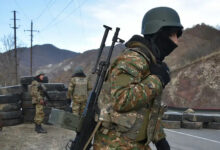 Armenia soldiers stand guard at checkpoint