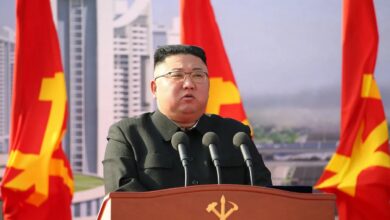 North Korean leader Kim Jong Un speaks during a ground-breaking ceremony in Pyongyang, 2021