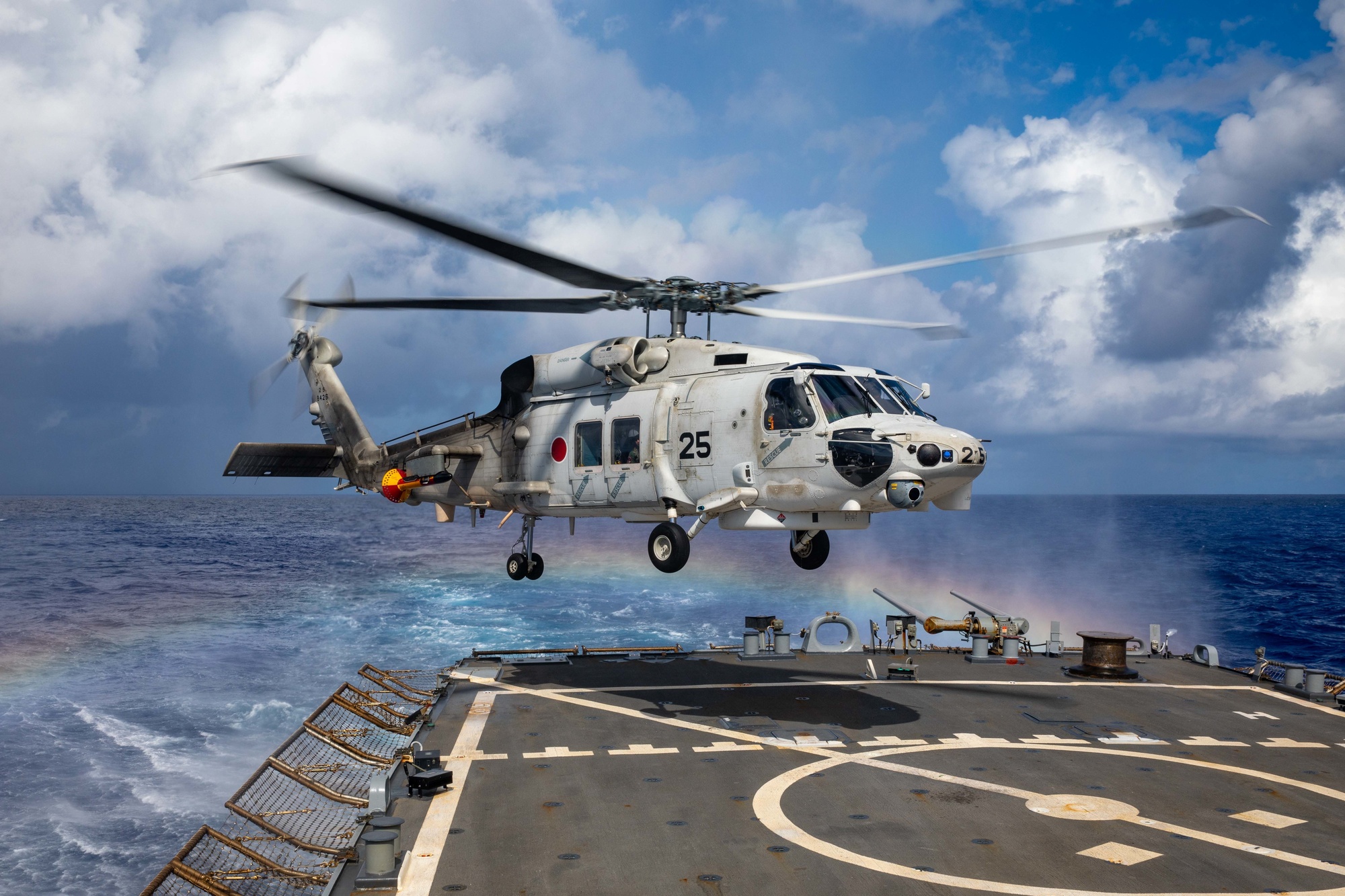 PHILIPPINE SEA (Aug. 26, 2021) A Japan Maritime Self-Defense Force Superhawk lands on the flight deck of the Arleigh Burke-class guided-missile destroyer USS Barry (DDG 52) during MALABAR 2021. Barry is currently on deployment supporting Commander, Task Force 71 (CTF 71)/Destroyer Squadron 15 (DESRON 15), the Navy’s largest forward-deployed DESRON and the U.S. 7th Fleet’s principal surface force. (U.S. Navy photo by Mass Communication Specialist 3rd Class Justin Stack)