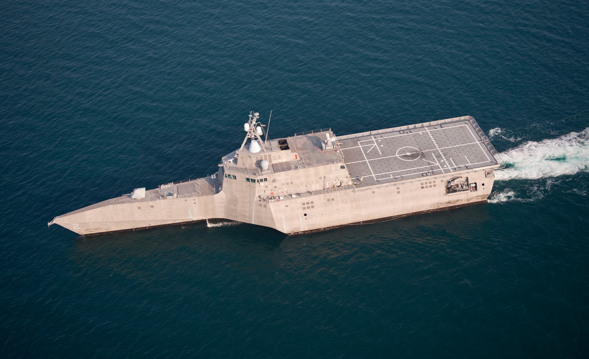 The littoral combat ship USS Independence (LCS 2) is underway in the Atlantic Ocean off the coast of Florida. Sailors assigned to Independence's Gold crew and embarked Mine Countermeasures Squadron, Detachment 1, departed Naval Station Mayport for the transit to San Diego after successfully completing testing on the mine countermeasures mission package.