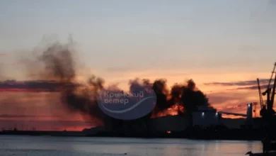 Smoke rising above a damaged warship after the Ukrainian attack on Russian-occupied southern Crimea