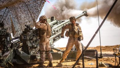 Marines with the 11th Marine Expeditionary Unit fire an M777 Howitzer during a fire mission in northern Syria as part of Operation Inherent Resolve