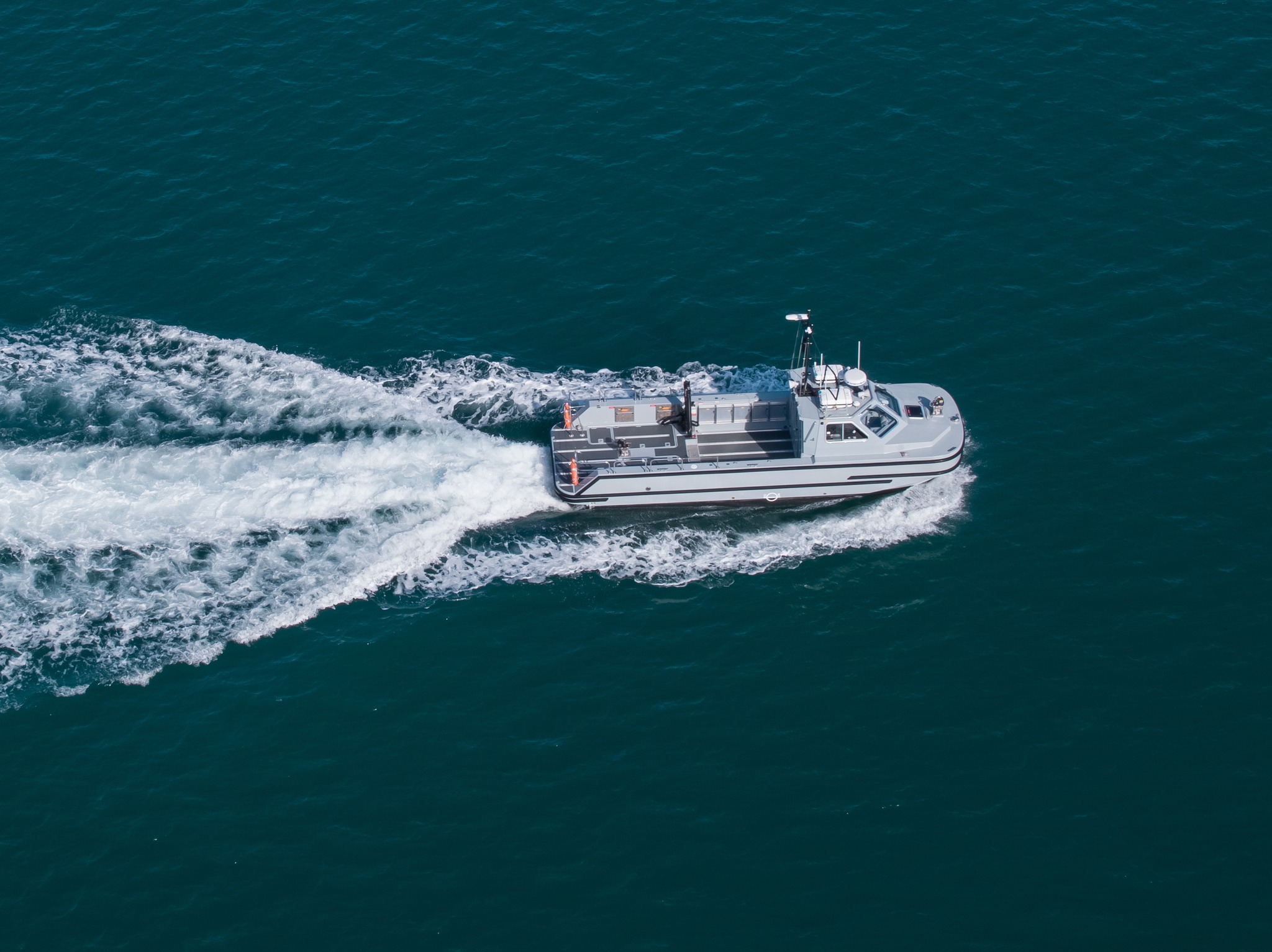 An 11m work boat moves at speed