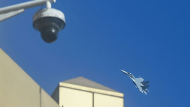 A Chinese jet fighter flies above a CCTV camera on Pingtan Island, the closest point in China to the main island of Taiwan, in this photo taken on January 13, 2024