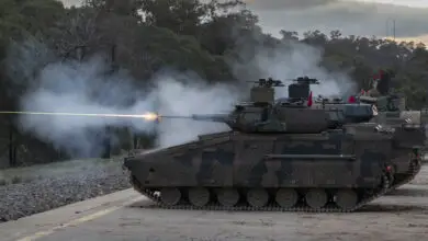 Hanwha Defense Australia Redback Infantry Fighting Vehicles conduct a live fire demonstration during LAND 400 Phase 3 user evaluation trials at Puckapunyal Military Area, Victoria. *** Local Caption *** Valued at between $18.1 billion and $27.1 billion, LAND 400 Phase 3 is the largest acquisition project in the Australian Armys history. The contenders for a new Infantry Fighting Vehicle are the Hanwha Defense Australia Redback and the Rheinmetall Defence Australia KF41 Lynx. Both tenderers have each delivered three prototype vehicles which are being extensively tested as part of a two-year Risk Mitigation Activity. Captured in this collection are activities undertaken at Puckapunyal, Victoria in June 2021, including extensive user evaluation trials and a live fire event. A decision on the preferred tenderer is expected to be presented to Government for consideration in 2022.