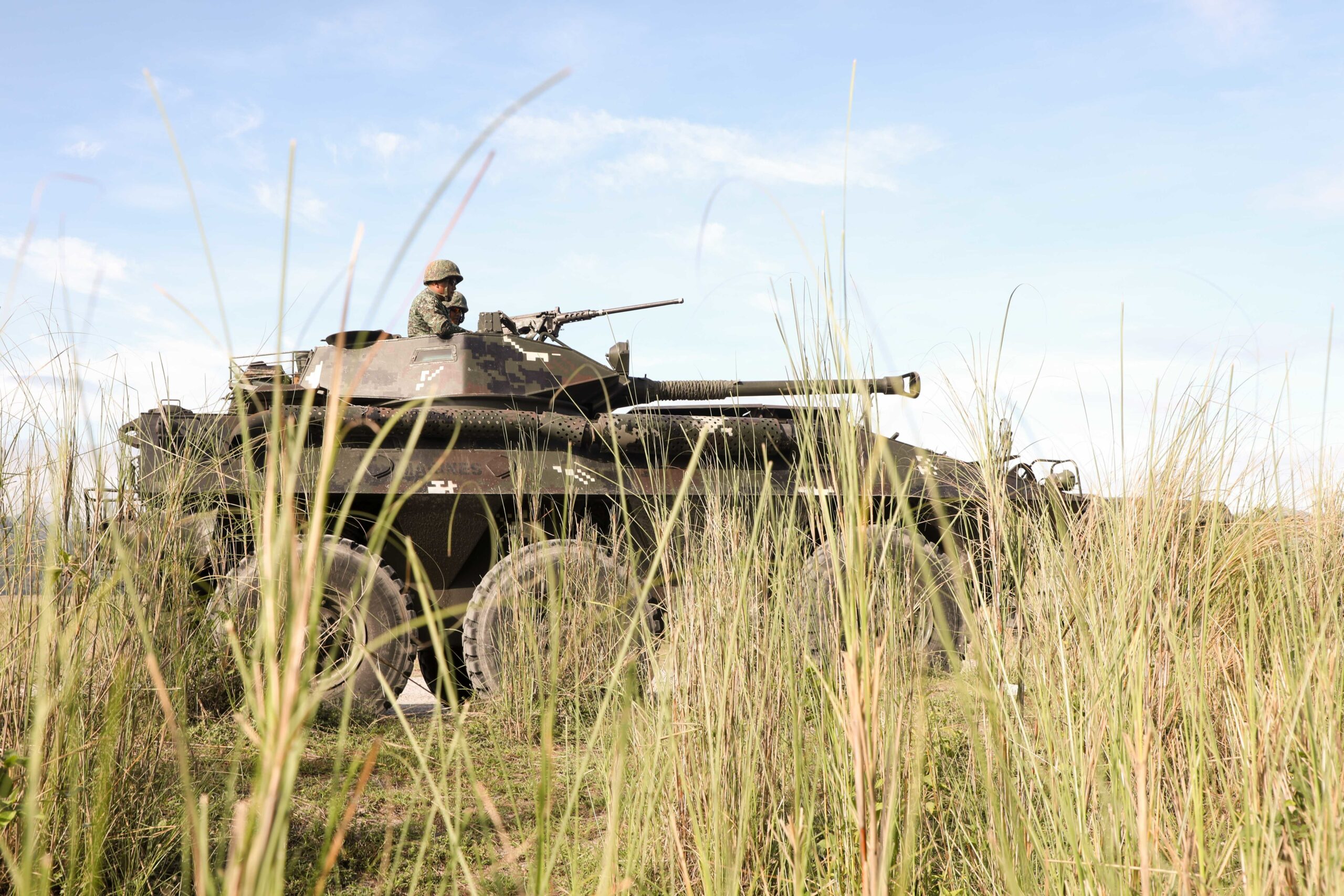 Philippine Marines riding in LAV-300s (Light Armored Vehicles) participate in a combined arms live-fire exercise (CALFEX) at Colonel Ernesto Ravina Air Base, Tarlac, Philippines, May 15, 2018, as part of Exercise Balikatan. The CALFEX is designed to demonstrate cooperation and interoperability between Philippine and U.S. forces as the two militaries continue their commitment to train and share information to improve their ability to coordinate a multilateral response to crisis. Exercise Balikatan, in its 34th iteration, is an annual U.S.-Philippine military training exercise focused on a variety of missions, including humanitarian assistance and disaster relief, counterterrorism, and other combined military operations held from May 7 to May 18. (U.S. Army photo by Staff Sgt. David Beckstrom)