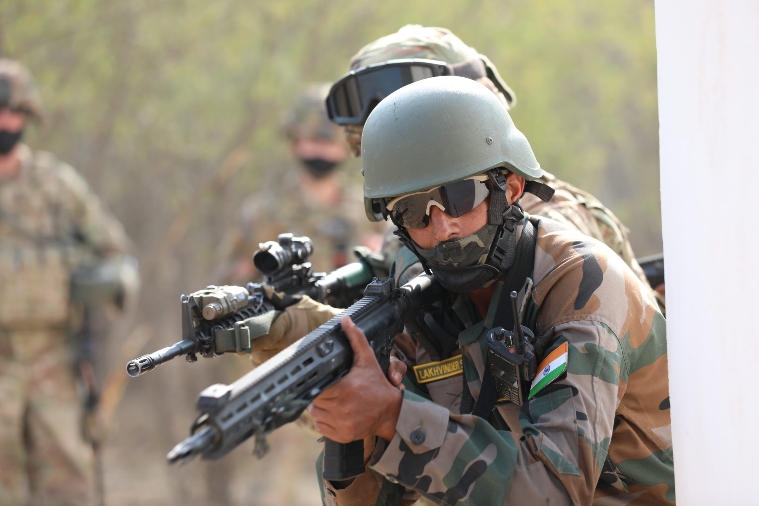 Combined squads of Indian and U.S. infantrymen practice small-unit tactics Feb. 9, 2021, during bilateral Indo-U.S. Exercise Yudh Abhyas at Mahajan Field Firing Range in Rajasthan, India. Now in its 16th iteration, Yudh Abhyas brings together India's 11th Jammu And Kashmir Rifles Battalion and the U.S. Army's 2-3 Infantry Battalion, 1-2 Stryker Brigade Combat Team, from Joint Base Lewis-McChord, Wash., in order to build on the enduring Indian-U.S. partnership through 14 days of combined field training, cultural exchange and a brigade-level command post exercise, leading to greater interoperability between the two nations in support of a free and open Indo-Pacific. (U.S. Army photo by Staff Sgt. Joseph Tolliver, 1-2 Stryker Brigade Combat Team public affairs.)