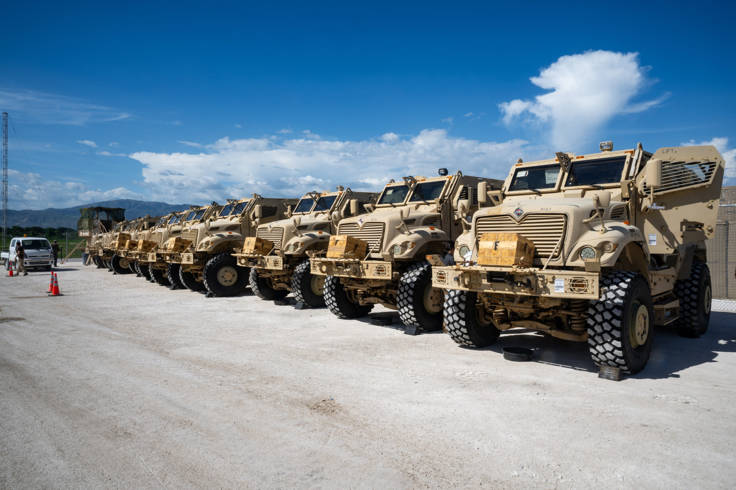 PORT-AU-PRINCE, Haiti — U.S. Department of Defense supplied Mine-Resistant Ambush Protected (MRAP) vehicles delivered to Port-au-Prince, Haiti, July 6-8, 2024 are prepared for transfer to Kenyan personnel deployed to the Caribbean nation as part of the Multinational Security Support (MSS) mission. The MSS Mission is utilizing 10 MRAPs transferred to it to help the Haitian National Police restore security in regions impacted by widespread gang violence. The MRAPs were delivered as part of the U.S. government’s ongoing support to Haitian-led security efforts in the country. At the direction of U.S. Southern Command, U.S. Air Force C-17 transport aircraft began delivering 24 additional MRAPs to Port-au-Prince Aug. 23 for transfer to the MSS. (U.S. Air Force photo by Senior Airman Mitchell Corley)