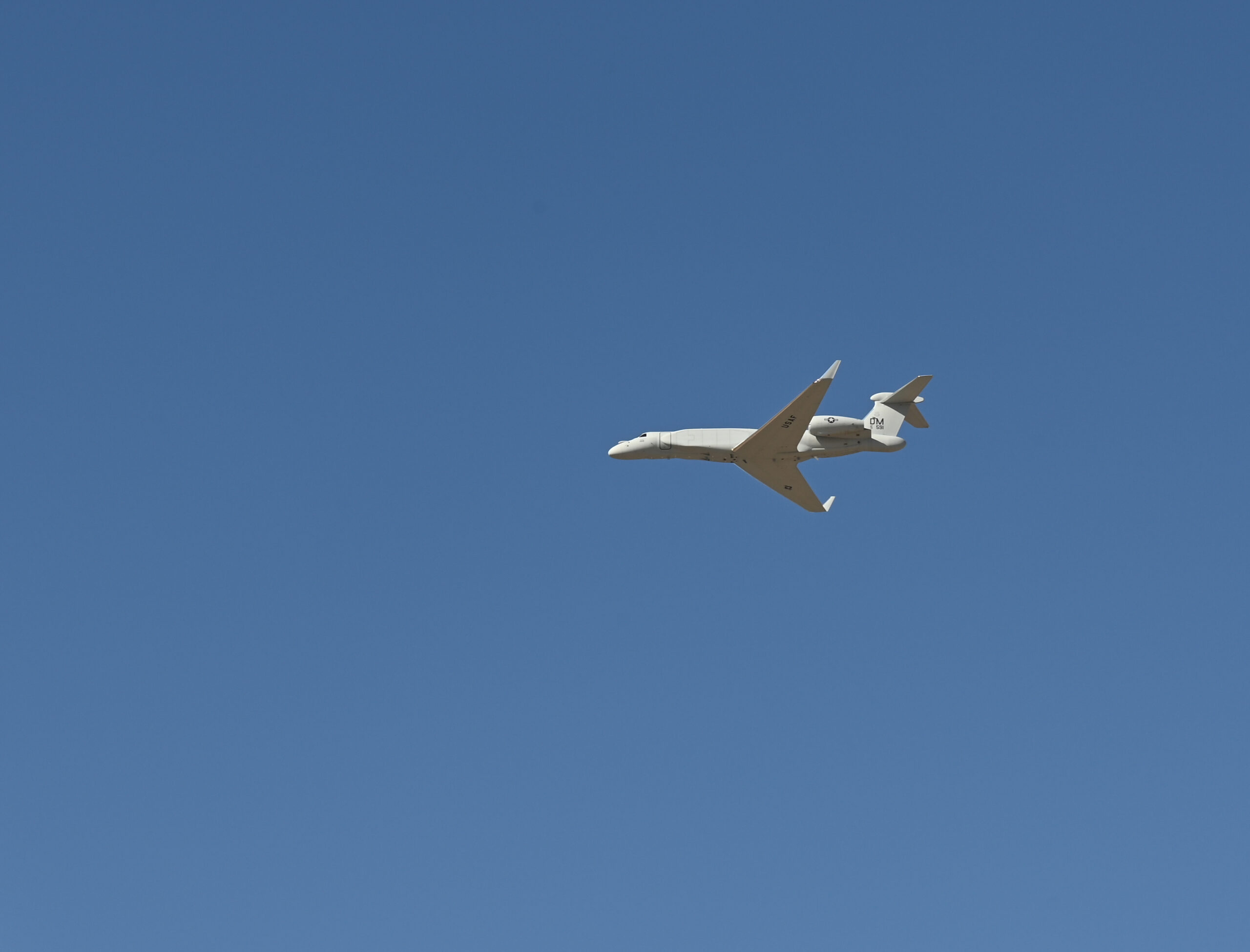 Air Combat Command’s first EA-37B Compass Call arrives overhead at Davis-Monthan AFB, Arizona, on Aug. 23, 2024. The aircraft will be assigned to the 55th Electronic Combat Group, flown by the 43rd Electronic Combat Squadron and maintained by the Contractor Logistics Support Aircraft Maintenance team at Davis-Monthan AFB. (U.S. Air Force photo by Senior Airman Paige Weldon)