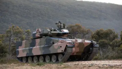 Hanwha Redback Infantry Fighting Vehicle delivered to Defence to support Test and Evaluation activities conducted as part of the LAND 400 Phase 3 Risk Mitigation Activity. Picture taken at the Australian Automotive Research Centre, Anglesea, Victoria, prior to delivery to Defence. *** Local Caption *** The LAND 400 Phase 3  Land Combat Vehicle System (Infantry Fighting Vehicle) project is scoped to deliver and support up to 450 Infantry Fighting Vehicles and a Manoeuvre Support Vehicle capability. The shortlisted tenderers, Hanwha Defense Australia and Rheinmetall Defence Australia, have each delivered three prototype test and evaluation vehicles as part of the two-year Risk Mitigation Activity. The Risk Mitigation Activity will include detailed testing and evaluation of the tendered vehicles and will provide Defence with the objective quality evidence to inform a Government decision in 2022.