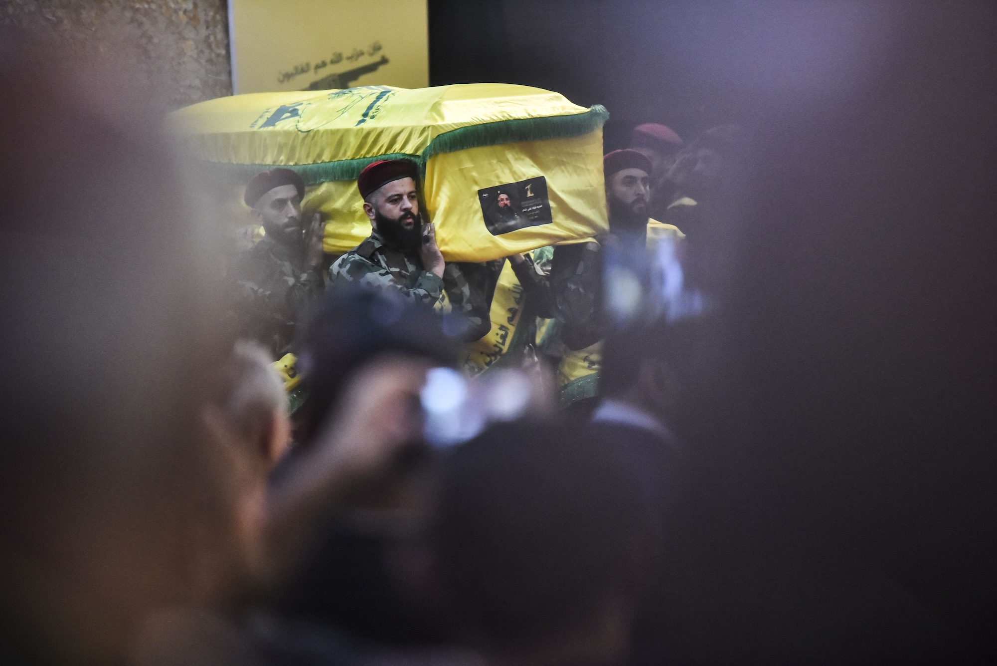 Hezbollah fighters and mourners are attending the funeral ceremony of slain top commander Fuad Shukr in Beirut's southern suburbs, on August 1, 2024