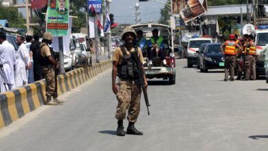 A Pakistani soldier stands guard in Pakistan's northwestern city of Mardan