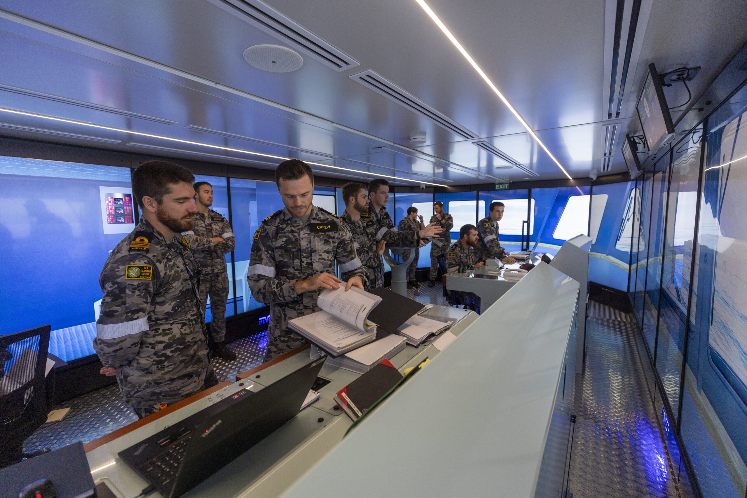 Members of HMAS Albany utilise the new bridge simulators at Defence Establishment Berrimah, Northern Territory. *** Local Caption *** Navys Patrol Boat Force will be better prepared for protecting Australias northern advances thanks to the two new bridge simulators implemented at Defence Establishment Berrimah, Northern Territory. The containerised full-mission simulators are based on the Arafura Class OPV and are provided by Pivot Maritime International. Designed to simulate bridge operations at sea, they are capable of supporting a full range of navigation training.