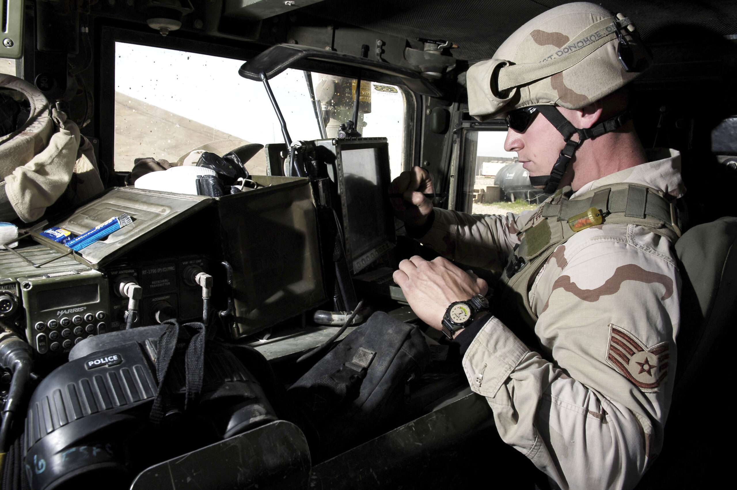 Staff Sgt. Patrick Donohoe, checks a Blue Force Tracker (BFT) at Kirkuk Reginal Air Base, Iraq. The BFT shows the location of all friendly units in the area, possible hazards, and also observes all enemy contact. Donohoe is a member of the Quick Reaction Force (QRF) team with the 506th Expeditonary Security Forces Squadron. (U.S. Air Force photo by Senior Airman Bradley A. Lail)