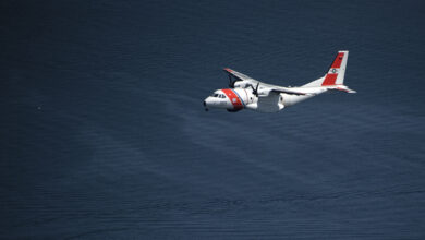 A Coast Guard Air Station Cape Cod HC-144 Ocean Sentry airplane flies over Newport, Rhode Island, Tuesday, May 8, 2018. The aircraft was part of a fly over for the opening of the Volvo Ocean Race village. (U.S Coast Guard photo by Petty Officer Andrew Barresi)