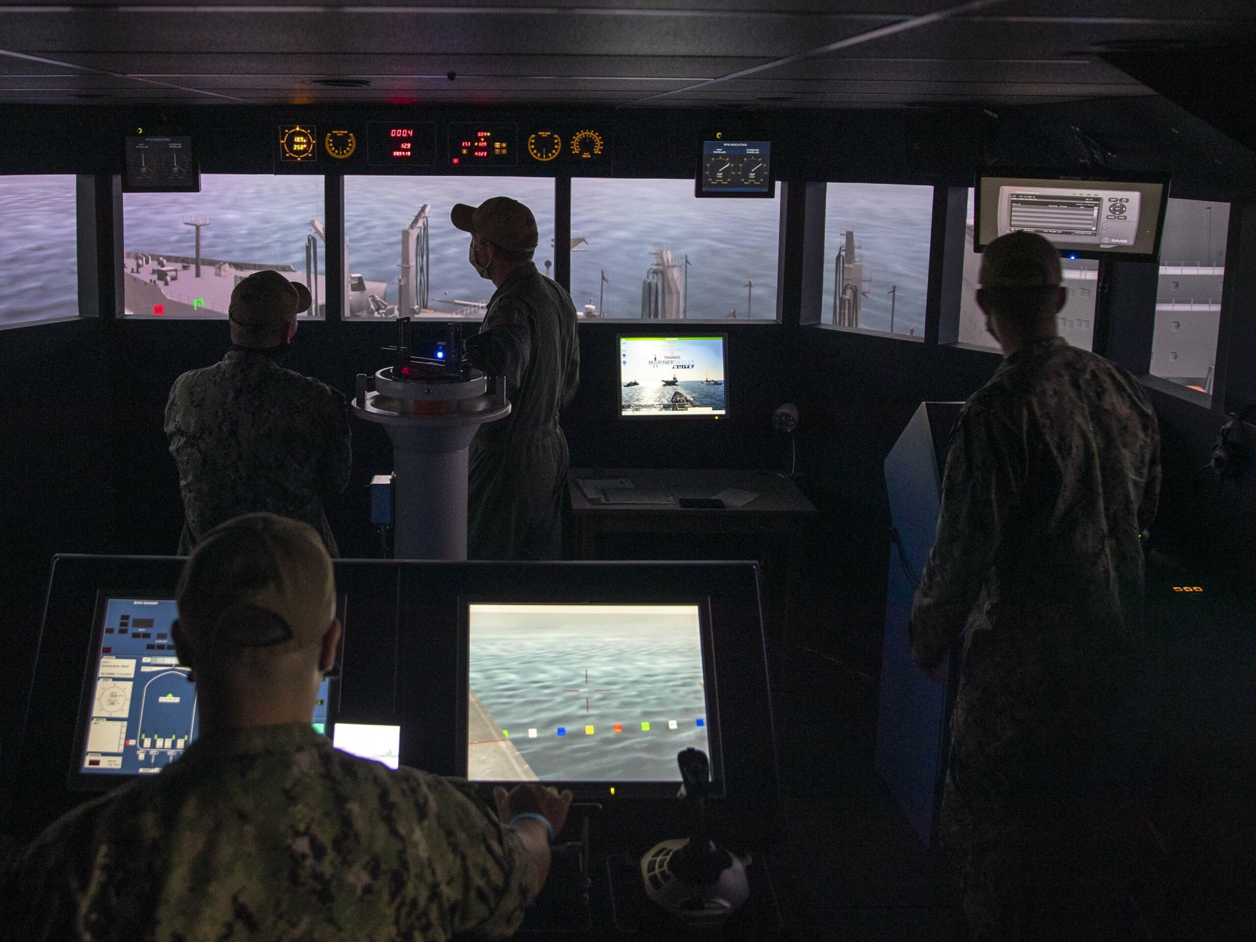 Sailors assigned to USS Gerald R. Ford's (CVN 78) bridge navigation training team, participate in a seamanship and navigation simulator during a visit to the Navigation, Seamanship and Ship-Handling Training Program (NSST) facility located on Naval Station Norfolk, Aug. 13, 2020. Ford is in port for a scheduled window of opportunity for maintenance as part of her Post-Delivery Test and Trials phase of operations. (U.S. Navy photo by Mass Communication Specialist Seaman Riley McDowell)