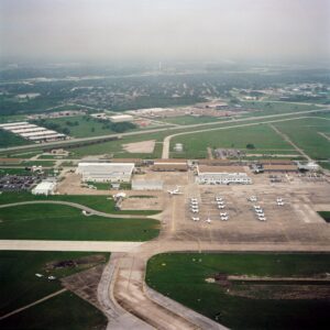 Various views of the Shuttle Carrier Aircraft (SCA) flying over the Ellington Field area taken in-flight from another aircraft (12356-8). View of the approach to Ellington Field from the air (12359).NASA Identifier: S98-12359