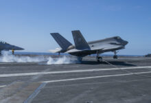 220309-N-DU622-1207 PACIFIC OCEAN (Mar. 9), An F-35C Lightning II, from the "Rough Raiders" of Strike Fighter Squadron (VFA) 125, makes an arrested gear landing on the flight deck of the aircraft carrier USS Nimitz (CVN 68). Nimitz is underway conducting routine operations. (U.S. Navy photo by Mass Communication Specialist 3rd Class Justin McTaggart)