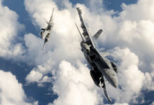 Two U.S. Navy EA-18G Growler aircraft attached to the Electronic Attack Squadron (VAQ) 138 "Yellowjackets", assigned to Carrier Task Force 70, break away from a KC-135 Stratotanker assigned to the 506th Expeditionary Air Refueling Squadron over the Pacific Ocean while flying in support of Exercise Valiant Shield 22 (VS22), June 13 2022. Exercises like VS22 allow forces across the Indo-Pacific the opportunity to integrate Navy, Marine Corps, Army, Air Force, and Space Force to train in precise, lethal, and overwhelming multi-axis, multi-domain effects that demonstrate the strength and versatility of the Joint Force. (U.S. Air Force photo by Master Sgt. Nicholas Priest)