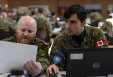 Canadian Army service members work on building a network hacking plan during Cyber Harmony 24 at The Royal Montreal Regiment, Quebec, Canada, April 27, 2024. Reserve Marines with Defensive Cybersecurity Operations, Company A, 6th Communication Battalion, Marine Forces Reserve, participated in Cyber Harmony 24 as the blue team, demonstrating their capabilities to act as defensive cyberspace operators, effectively driving Marine and joint NATO allies’ defensive cyber capabilities towards their training objectives via a digital capture the flag simulation. (U.S. Marine Corps photo by Lance Cpl. Juan Diaz)