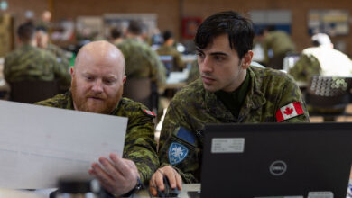 Canadian Army service members work on building a network hacking plan during Cyber Harmony 24 at The Royal Montreal Regiment, Quebec, Canada, April 27, 2024. Reserve Marines with Defensive Cybersecurity Operations, Company A, 6th Communication Battalion, Marine Forces Reserve, participated in Cyber Harmony 24 as the blue team, demonstrating their capabilities to act as defensive cyberspace operators, effectively driving Marine and joint NATO allies’ defensive cyber capabilities towards their training objectives via a digital capture the flag simulation. (U.S. Marine Corps photo by Lance Cpl. Juan Diaz)