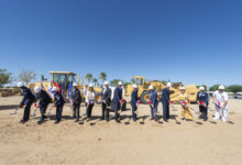 Base leaders, prospective tenants, mission partners and other senior officials break ground on a commercial apartment complex on Edwards Air Force Base, California, Sept. 10. (Air Force photo by Chloe Bonaccorsi)