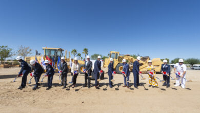 Base leaders, prospective tenants, mission partners and other senior officials break ground on a commercial apartment complex on Edwards Air Force Base, California, Sept. 10. (Air Force photo by Chloe Bonaccorsi)