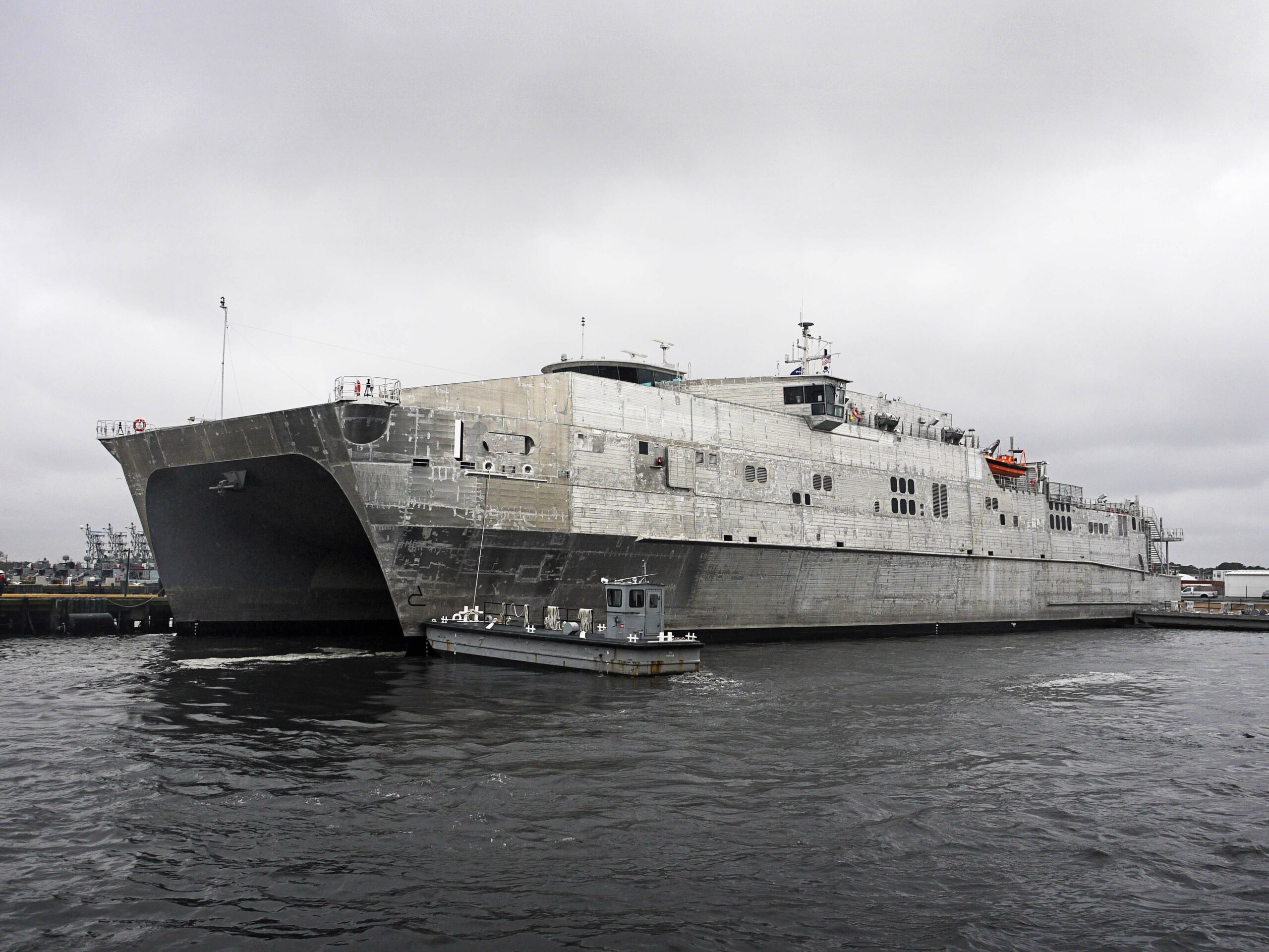 The Military Sealift Command joint high-speed vessel USNS Spearhead (JHSV-1) pulls into Joint Expeditionary Base Little Creek-Fort Story. Spearhead is the first of nine Navy joint high-speed vessels and is designed for rapid intra-theater transport of troops and military equipment. (U.S. Navy photo by William Cook/Released)