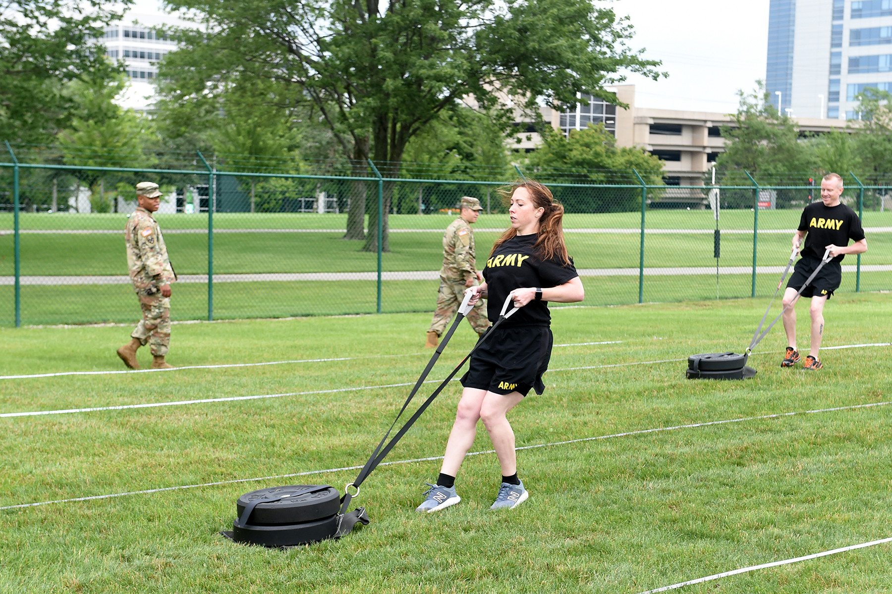 Soldier pulls a 90-pound sled during the Sprint-Drag-Carry portion of the Army Combat Fitness Test