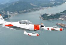 Three Fuji T-5 trainers in flight