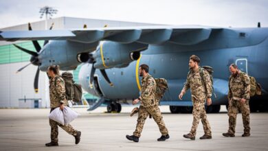 Bundeswehr soldiers leave an Airbus A400M transport aircraft of the German Air Force after Germany ended its mission in Niger