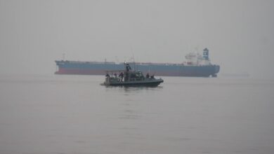 Marines assigned to Fleet Anti-Terrorism Security Team, Central Command (FASTCENT), approach the Arc Liberty, a Military Sealift Command time chartered vessel, in the Arabian Gulf to provide embarked security during a Strait of Hormuz transit.