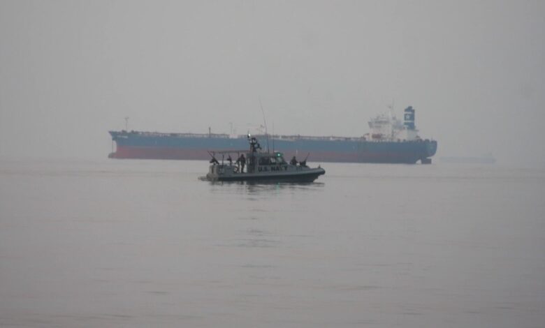 Marines assigned to Fleet Anti-Terrorism Security Team, Central Command (FASTCENT), approach the Arc Liberty, a Military Sealift Command time chartered vessel, in the Arabian Gulf to provide embarked security during a Strait of Hormuz transit.