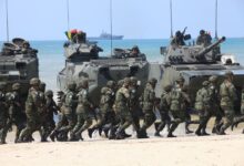 The Royal Thai Navy conducting exercises on the beach