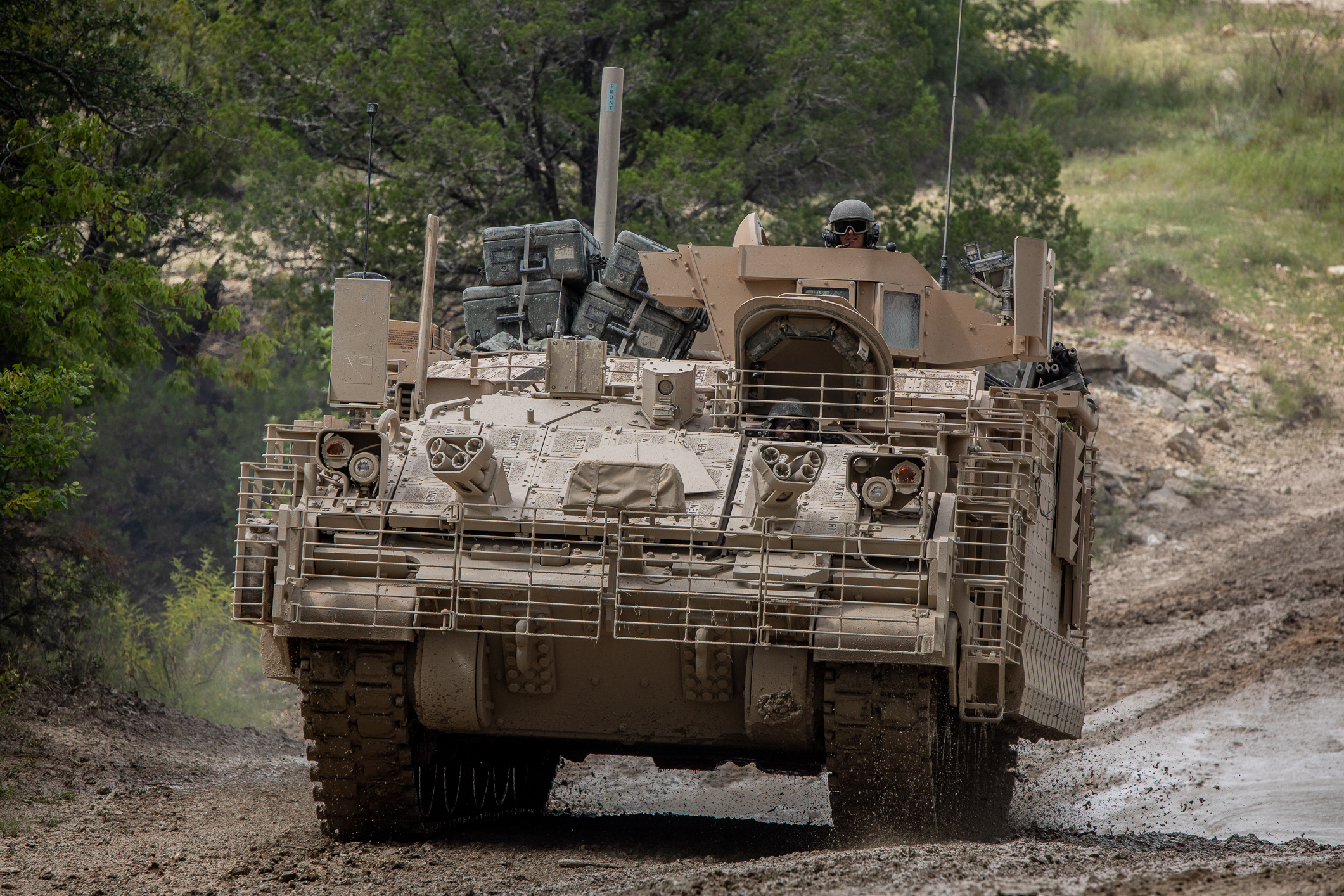 Soldiers from 4th Squadron, 9th U.S. Cavalry Regiment "Dark Horse," 2nd Armored Brigade Combat Team, 1st Cavalry Division, drive through a low-water crossing in the Armored Multi-Purpose Vehicle (AMPV) after completing field testing on Fort Hood, Texas Sept. 24. The two-month AMPV field test ended Sept. 24. (Photo Credit: Maj. Carson Petry (1st CAV))