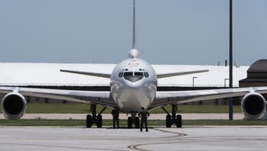 A U.S. Navy E-6B Mercury aircraft, assigned to Strategic Communications Wing 1 at Tinker Air Force Base, Oklahoma, receives post-flight maintenance after landing at Offutt AFB, Nebraska, July 15, 2019. In August 1989, the E-6A replaced the EC-130Q in the performance of the Navy's Take Charge and Move Out mission which links the National Command Authority with naval ballistic missile forces during times of crisis. The first E-6B aircraft was accepted in December 1997, and the E-6B assumed its dual operational mission in October 1998. The E-6 fleet was completely modified to the E-6B configuration in 2003. (U.S. Air Force photo by Staff Sgt. Jacob Skovo)