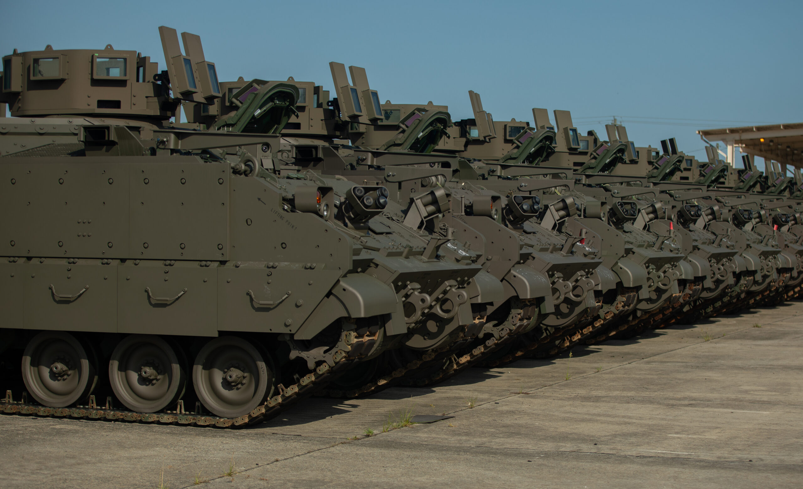 A row of Armored Multi-Purpose Vehicles (AMPV) sit in a motorpool for issue and receiving for the 2nd Armored Brigade Combat Team, 3rd Infantry Division at Fort Stewart, Georgia, Aug. 15, 2024. The Spartan Brigade is the second brigade in the Army to receive the AMPVs and is currently undergoing familiarization and training to prepare Soldiers on the next generation of tracked combat vehicles in accordance with the Army’s key initiatives for lethality, readiness and modernization. (U.S. Army photo by Sgt. Bernabe Lopez III)