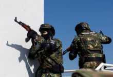 Bulgarian military police prepare to secure a room during a building breach as part of force protection and active shooter drill on Novo Selo Training Area, Bulgaria, Sept. 26, 2024. Exercises like this provide critical insights into how the U.S. can support NATO partners and allies during high-stakes missions. (U.S. Army photo by Sgt. Nolan Brewer)