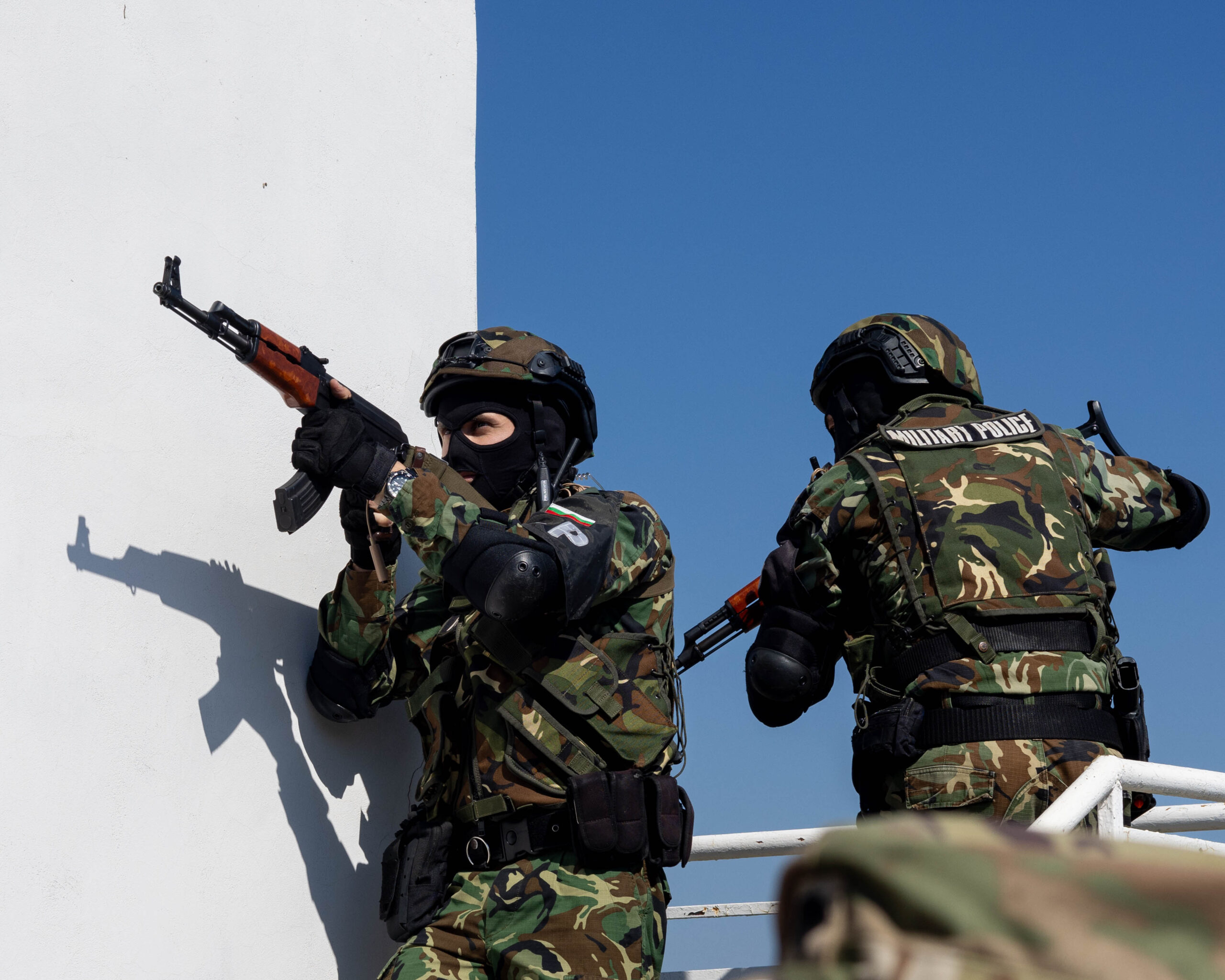 Bulgarian military police prepare to secure a room during a building breach as part of force protection and active shooter drill on Novo Selo Training Area, Bulgaria, Sept. 26, 2024. Exercises like this provide critical insights into how the U.S. can support NATO partners and allies during high-stakes missions. (U.S. Army photo by Sgt. Nolan Brewer)