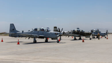 Three A-29 Super Tucanos prepare for a ferry flight to Edwards Air Force Base, California, July 18, where they will join a unique fleet at the U.S. Air Force Test Pilot School. (Air Force photo by Richard Gonzales)