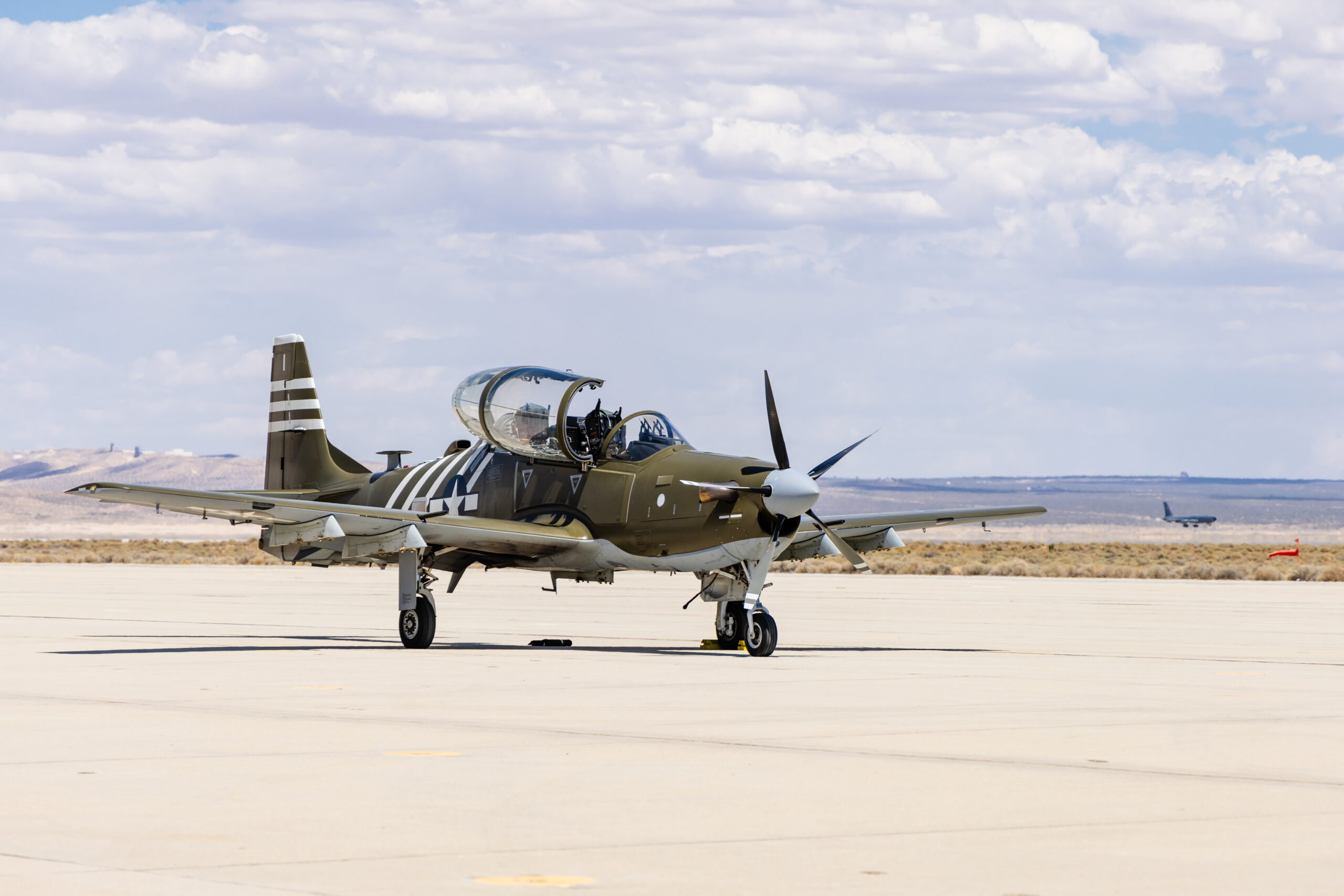 An A-29 Super Tucano arrives at Edwards Air Force Base, California, July 18, where it will join a unique fleet at the U.S. Air Force Test Pilot School. (Air Force photo by Lindsey Iniguez)