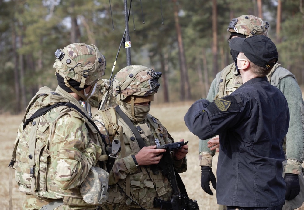 US Army soldiers assigned to "Wild Bill" Platoon, 1st Squadron, 7th Cavalry Regiment and 1st Battalion, 4th Infantry Regiment conduct electronic warfare training.