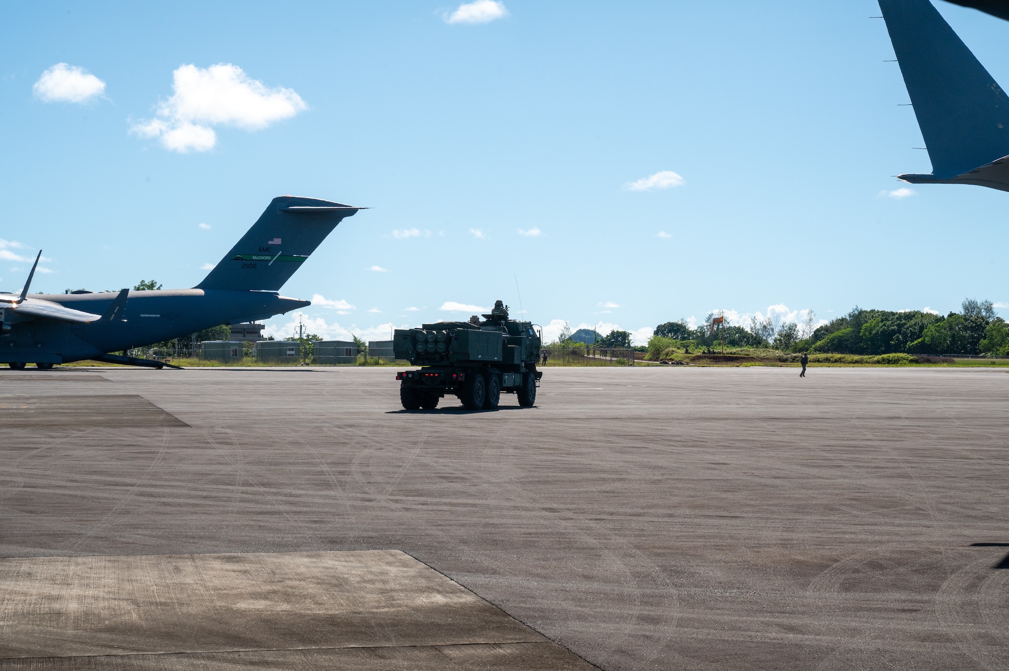 US Army soldiers assigned to the 17th Field Artillery Brigade drive a High Mobility Artillery Rocket System to conduct a High-Intensity Rapid Air Insertion training during Joint Pacific Multinational Readiness Center on Palau, October 11, 2024