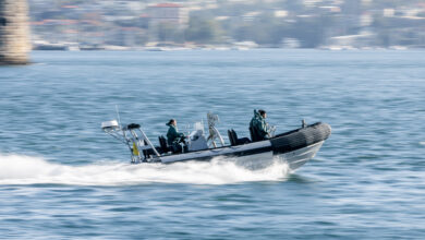 A rigid hull inflatable boat moves to the action scene during the NCIS filming in Sydney Harbour, NSW. *** Local Caption *** Navy people, ships and aircraft add authenticity and action to NCIS: Sydney, the first international edition of the highly successful US television series. The series premiers in Australia on 10 November and in the United States on 13 November. For Navy, NCIS: Sydney is an opportunity to amplify Navys current recruiting campaign to attract more talented men and women to join for a meaningful career option.